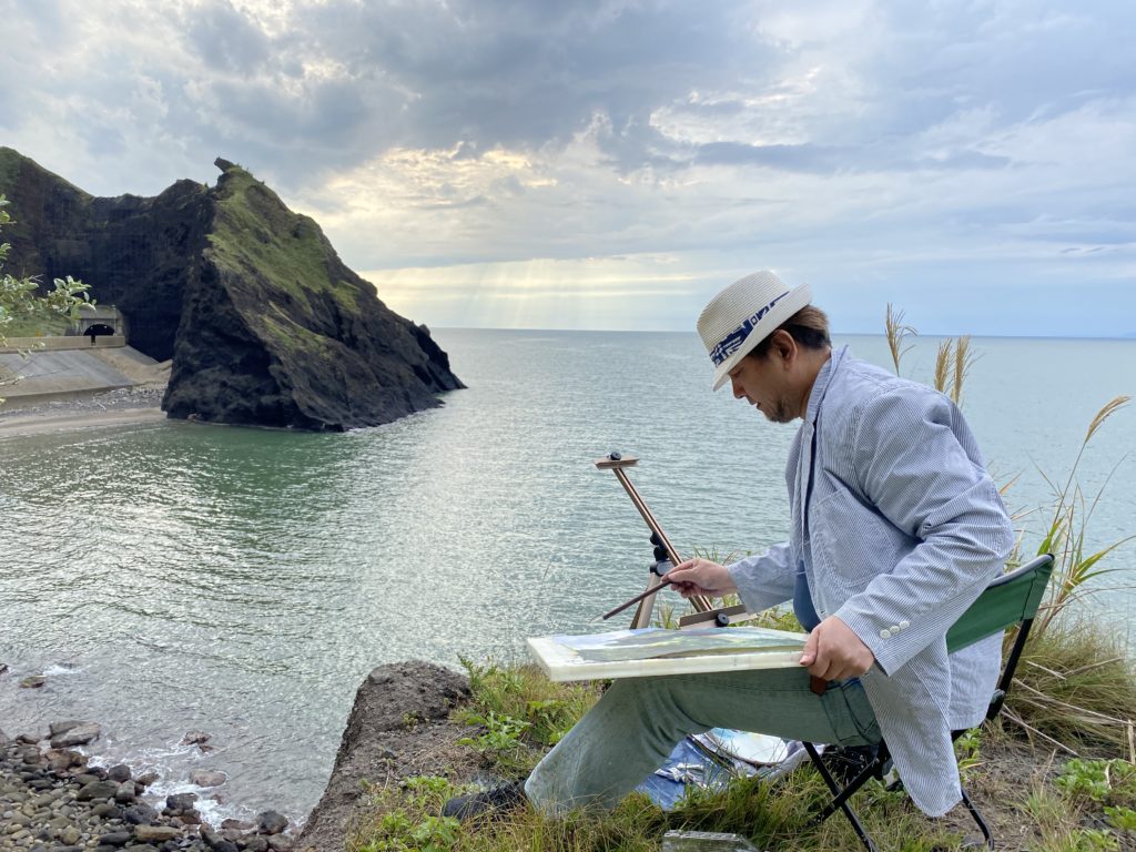 水彩画家　東富有　日本海越後七海シーサイドラインを描く